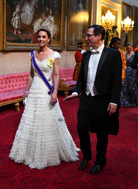 Kate Middleton enters the banquet through Buckingham Palace's East Gallery.