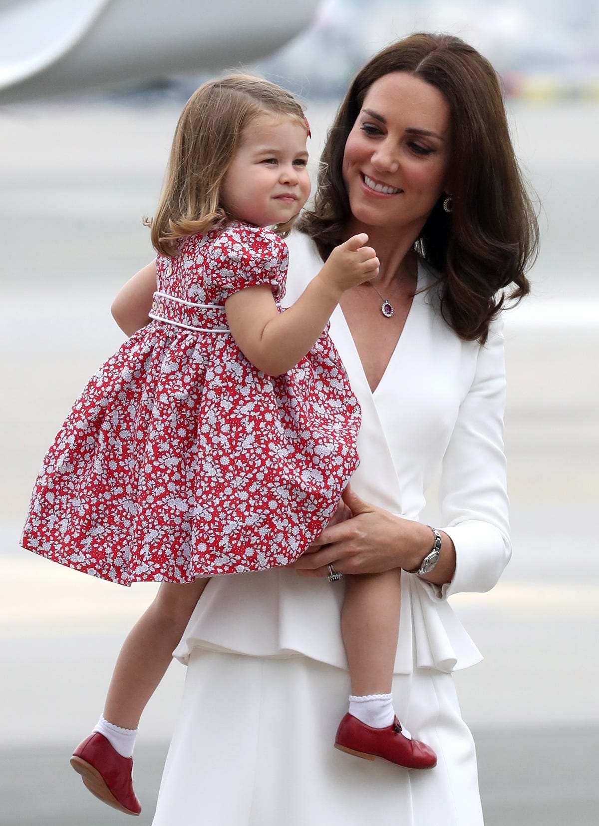 Duchess of Cambridge and Princess Charlotte after the wedding of