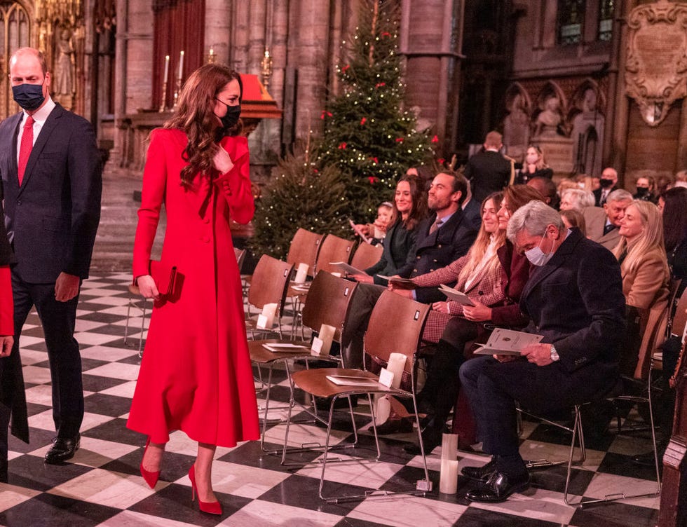 The Duchess of Cambridge looks festive in red at Christmas carol concert