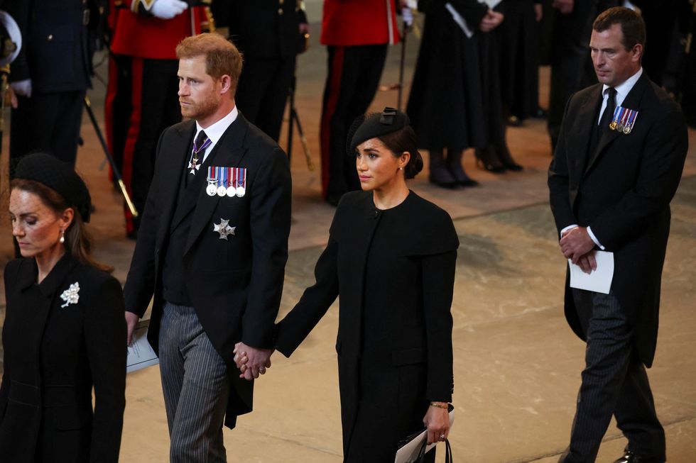 meghan markle and prince harry at the queen's funeral