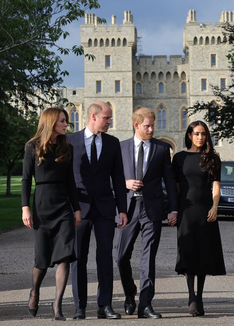 the prince and princess of wales accompanied by the duke and duchess of sussex greet well-wishers outside windsor castle