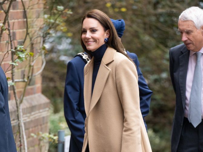 Kate Middleton remixes camel and navy for nursing home visit