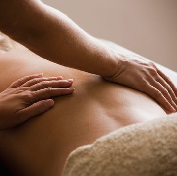 caucasian woman receiving massage