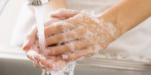 caucasian woman washing her hands