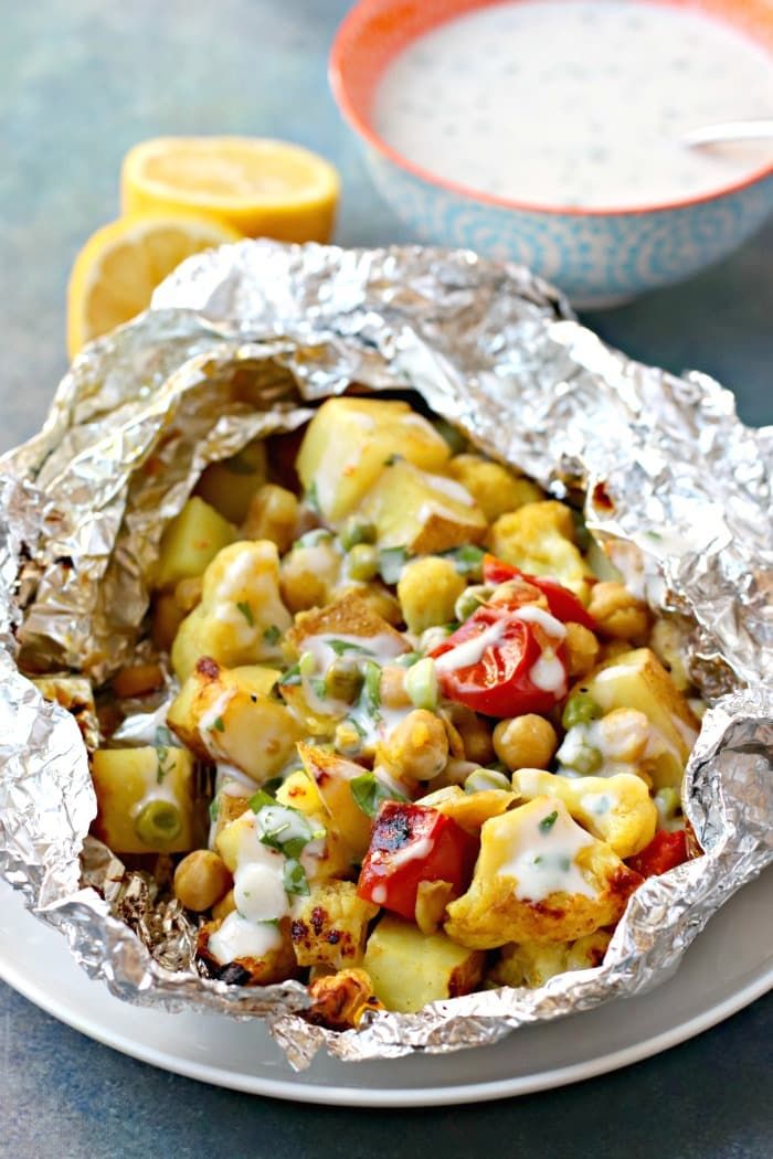 https://hips.hearstapps.com/hmg-prod/images/cauliflower-curry-foil-packet-recipe-1558563456.jpg