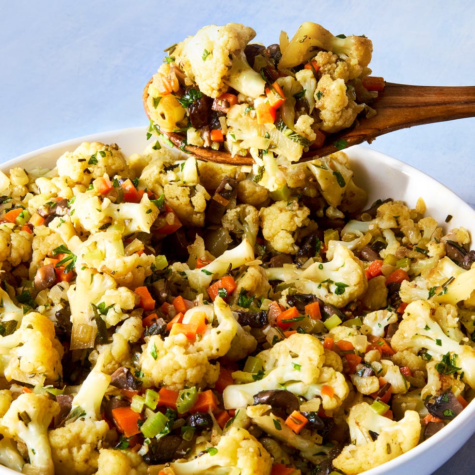 roasted cauliflower with veggies in a dish