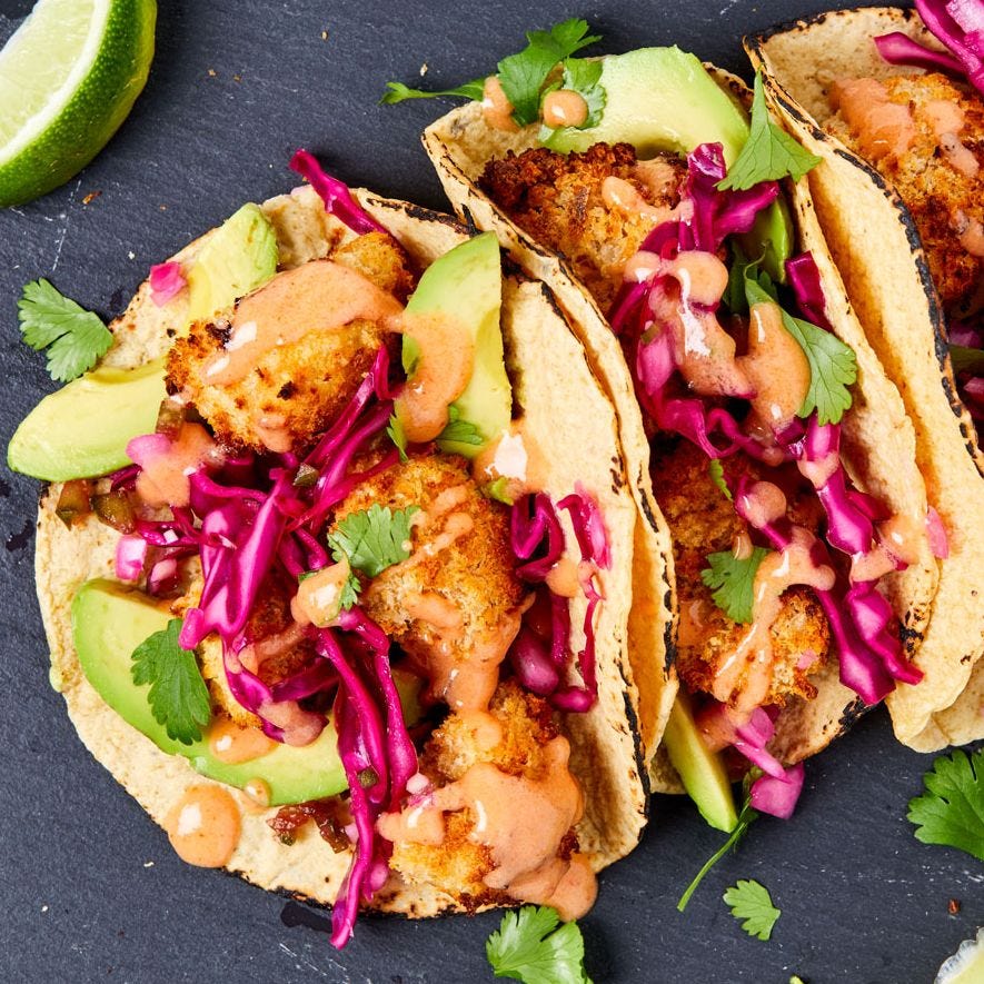 air fryer cauliflower tacos on a black slate