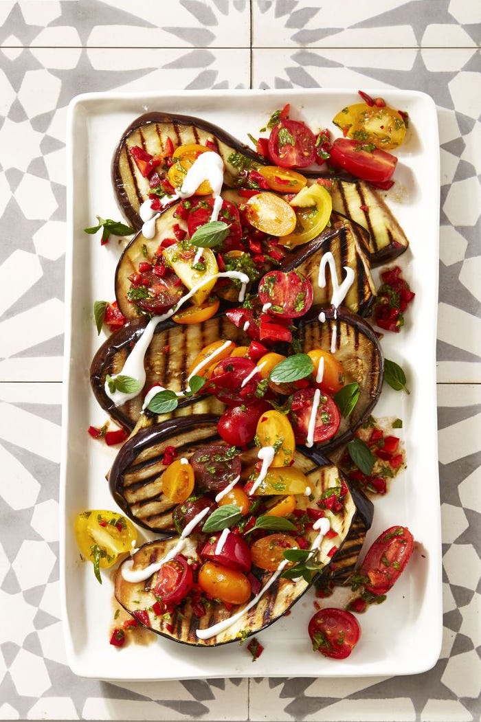 Cayenne Grilled Eggplant with Fresh Tomato Salad - Memorial Day Side Dishes cayenne grilled eggplant with fresh tomato salad on a white plate
