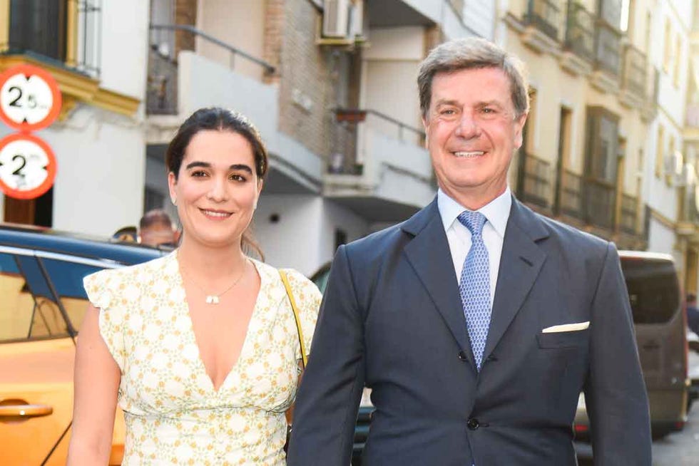 a man and woman posing for a picture