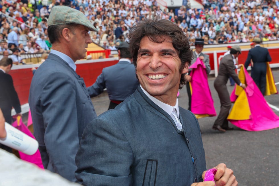 Pink, Event, Tradition, Sport venue, Crowd, Matador, Fun, Stadium, Outerwear, World, 
