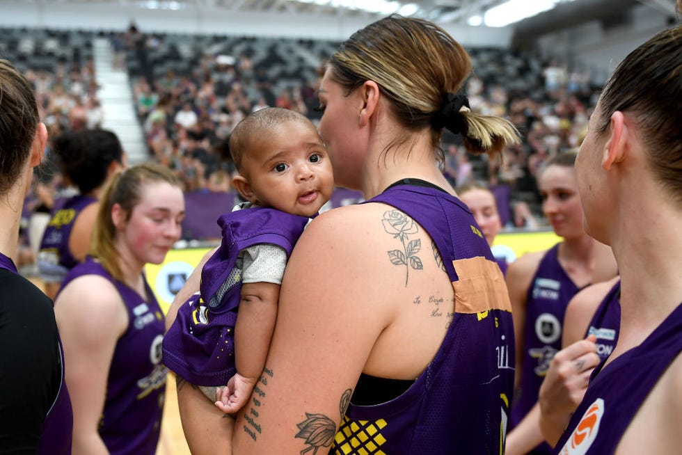 basketball player cayla george with her son