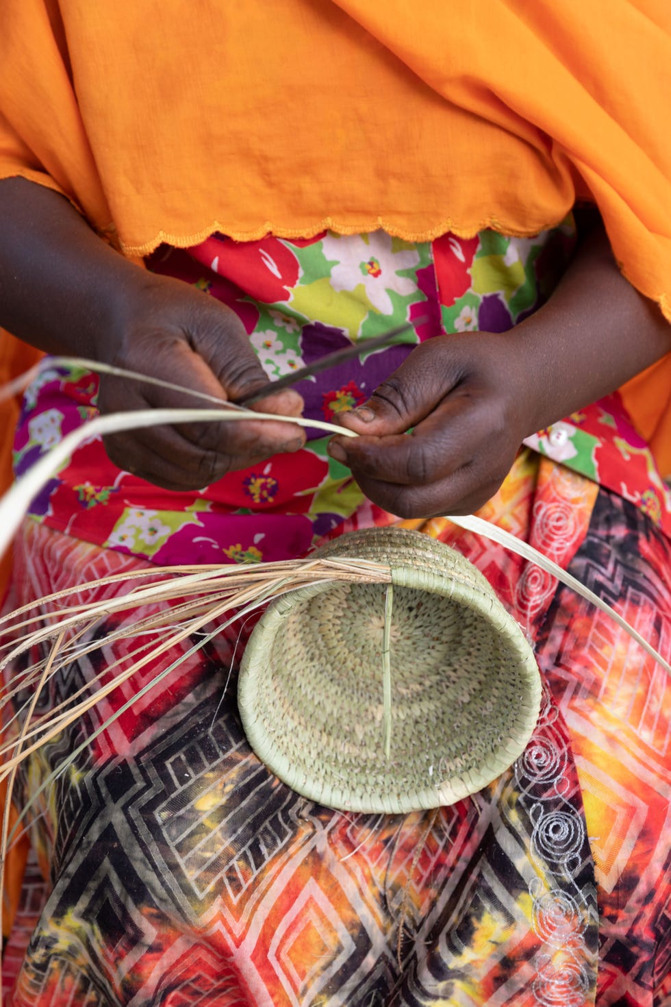 the intricate, highly skilled work of weaving with sisal fiber