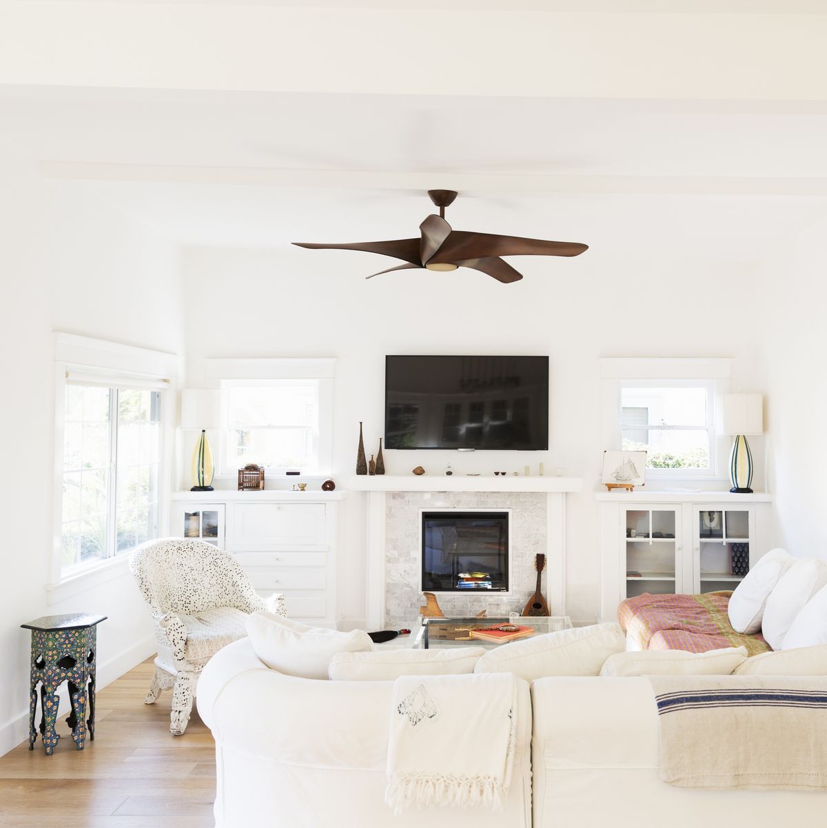 Ceiling fan over white living room