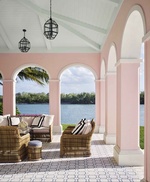 pink stucco terrace on the water in naples, florida