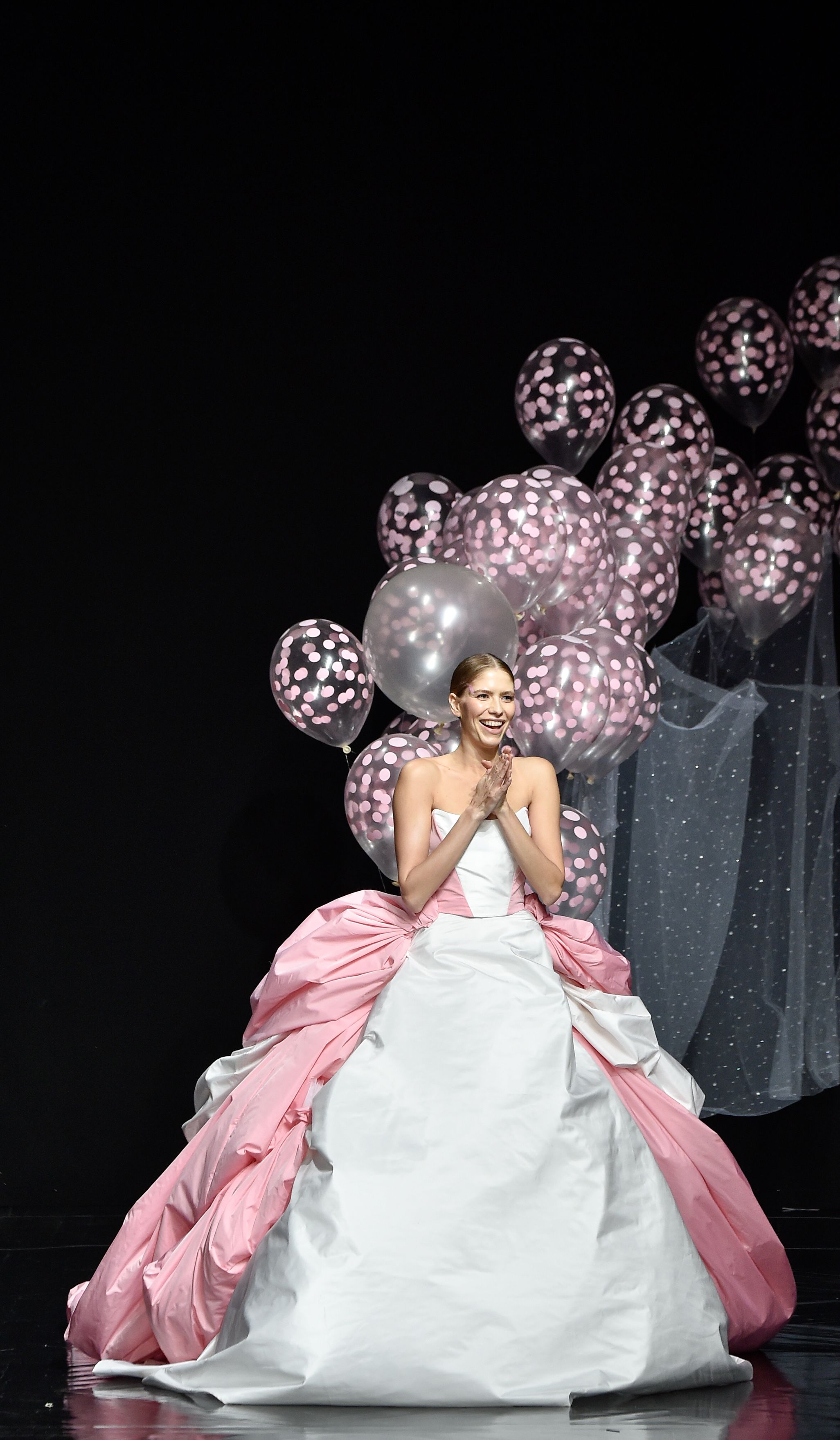 Model closes the Celia Kritharioti haute couture show with a