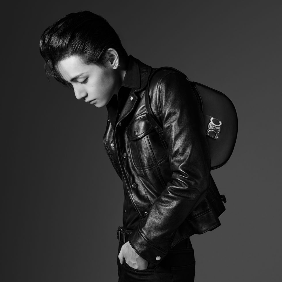 a man in a leather jacket