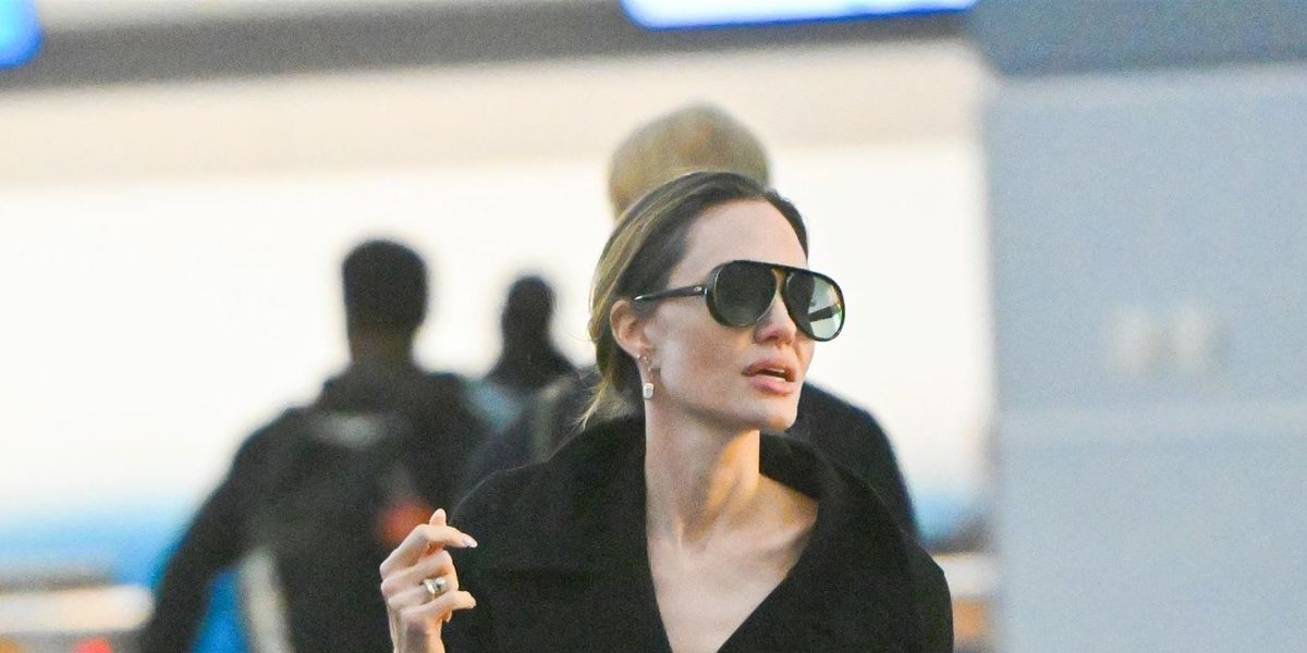 Smythson on X: Angelina Jolie carries the iconic 1887 bag in black    / X