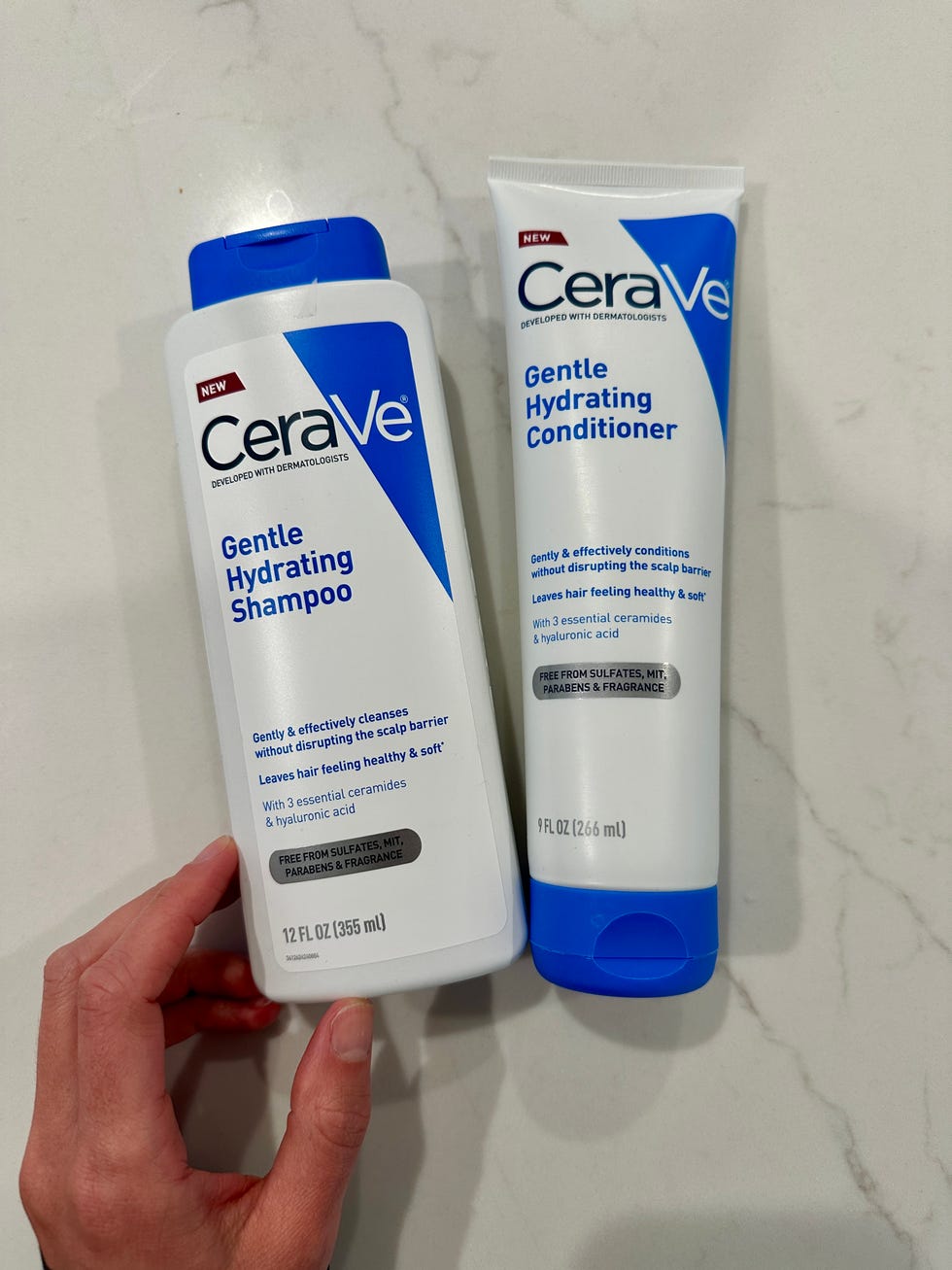 cerave gentle hydrating shampoo and conditioner on a counter