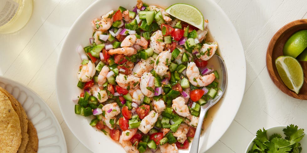 shrimp ceviche with tomatoes, cucumbers and red onion