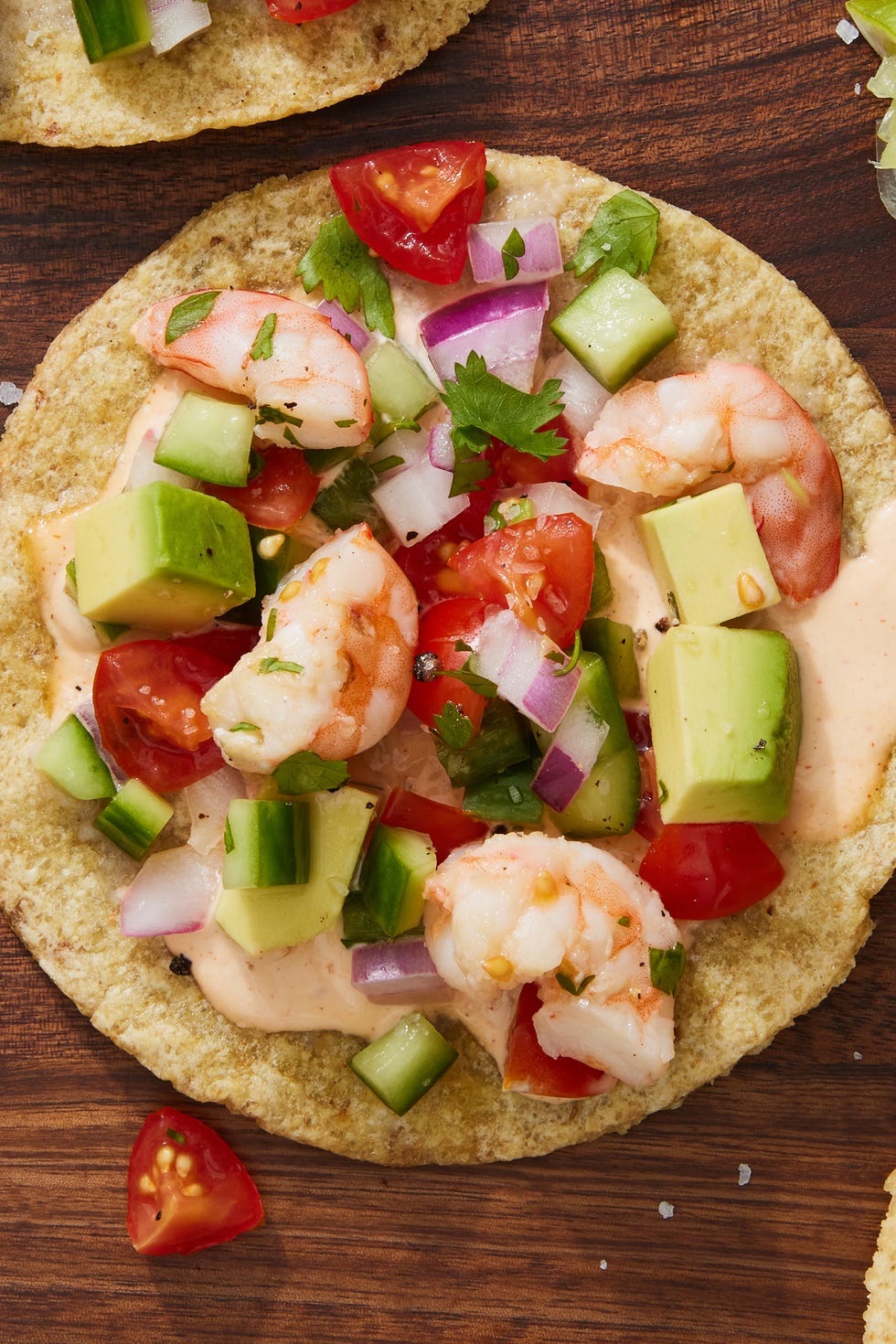 shrimp ceviche with tomatoes, cucumbers and red onion