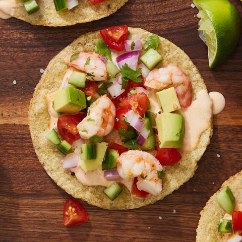 shrimp ceviche with tomatoes, cucumbers and red onion