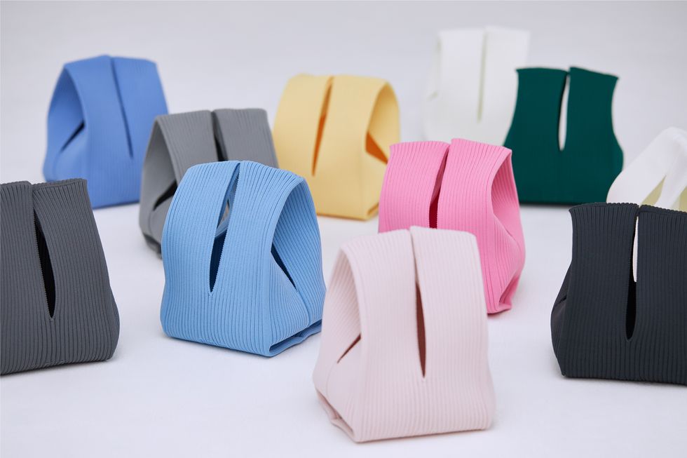 a group of different colored bags