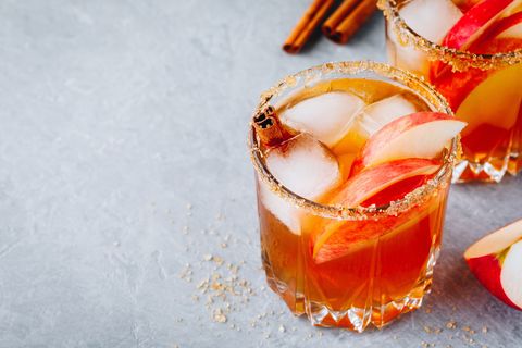 chai spiced apple cider cocktail for halloween or thanksgiving in glass