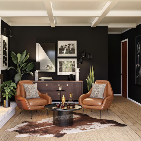3d rendering of a living space with cowhide, leather, and black accents with plenty of plants