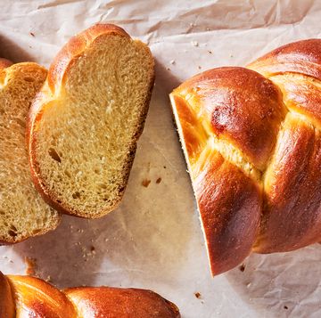 braided challah braid in a loaf and sliced