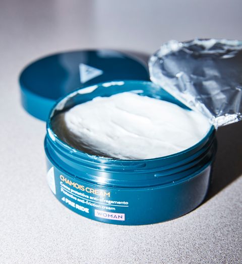 closeup of an open container of chamois cream