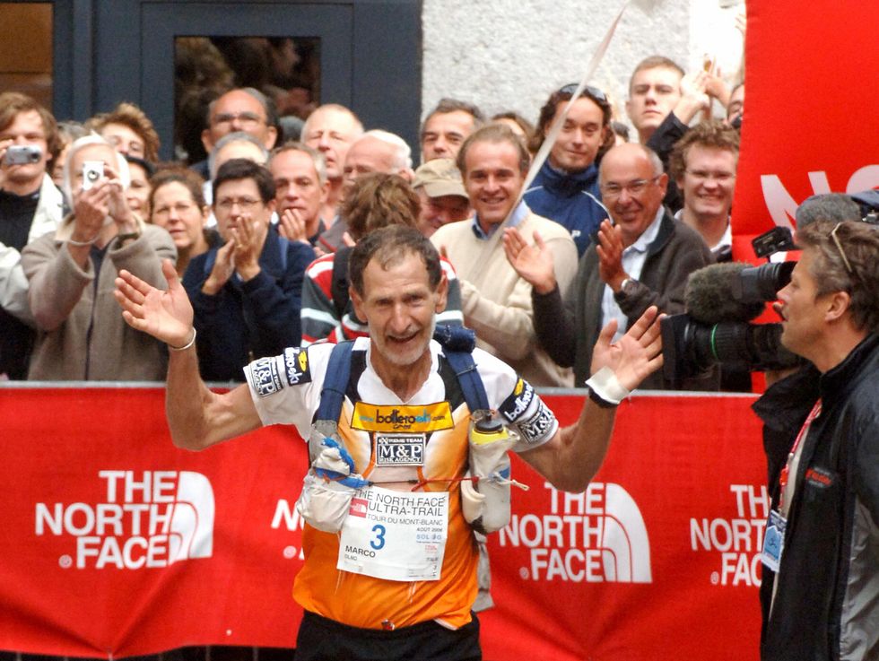 italy's marco olmo celebrates as he arri