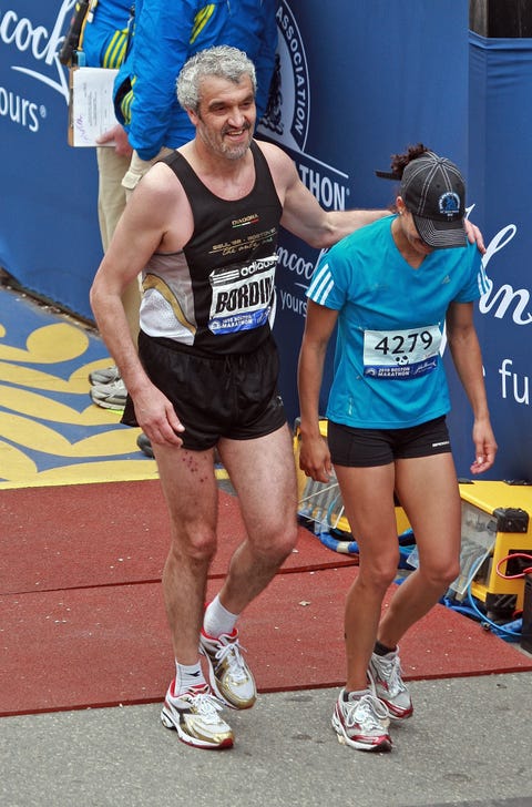 041910 boston, ma1990 champ gelindo bordin walks with varinkabarbini past the finish the finish line of the 114th running of the boston marathon in bostonmonday april 19, 2010 staff photo by nancy lane