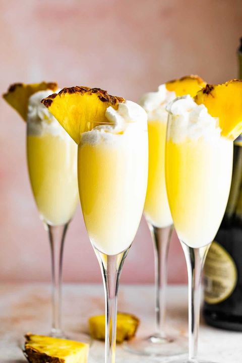 pineapple dole whip mimosas with whipped cream