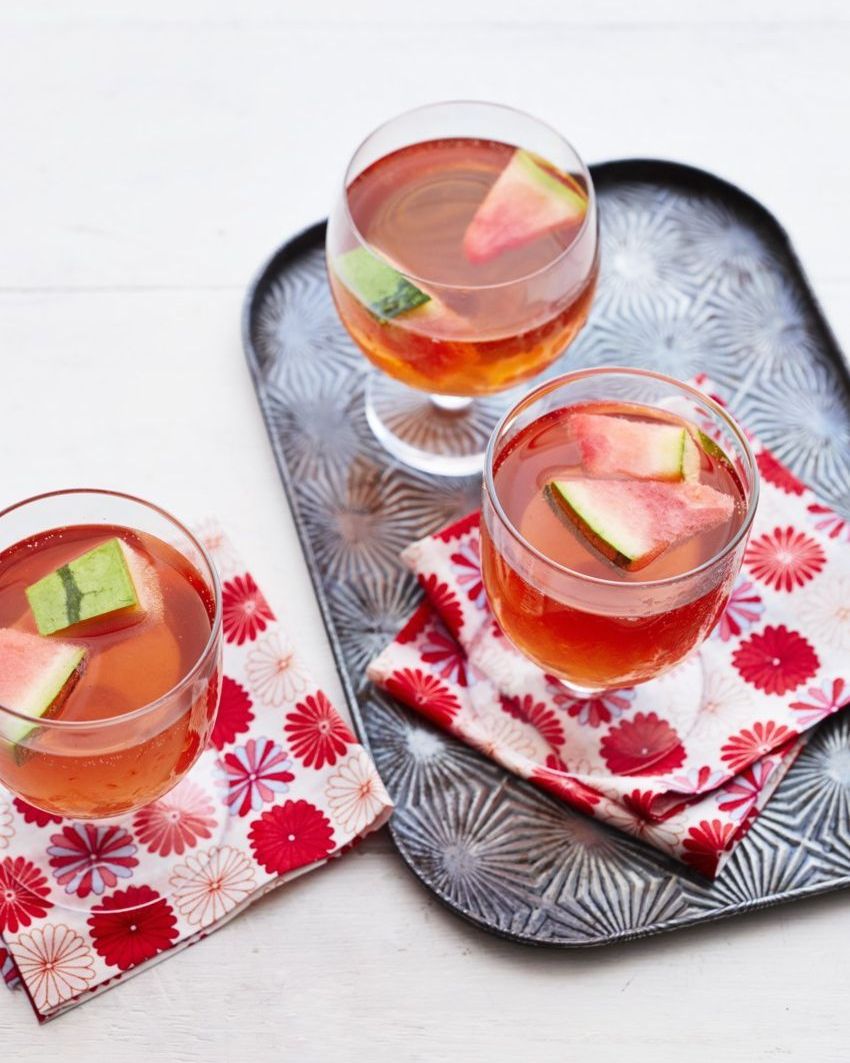 watermelon sangria on metal tray with pink floral napkins
