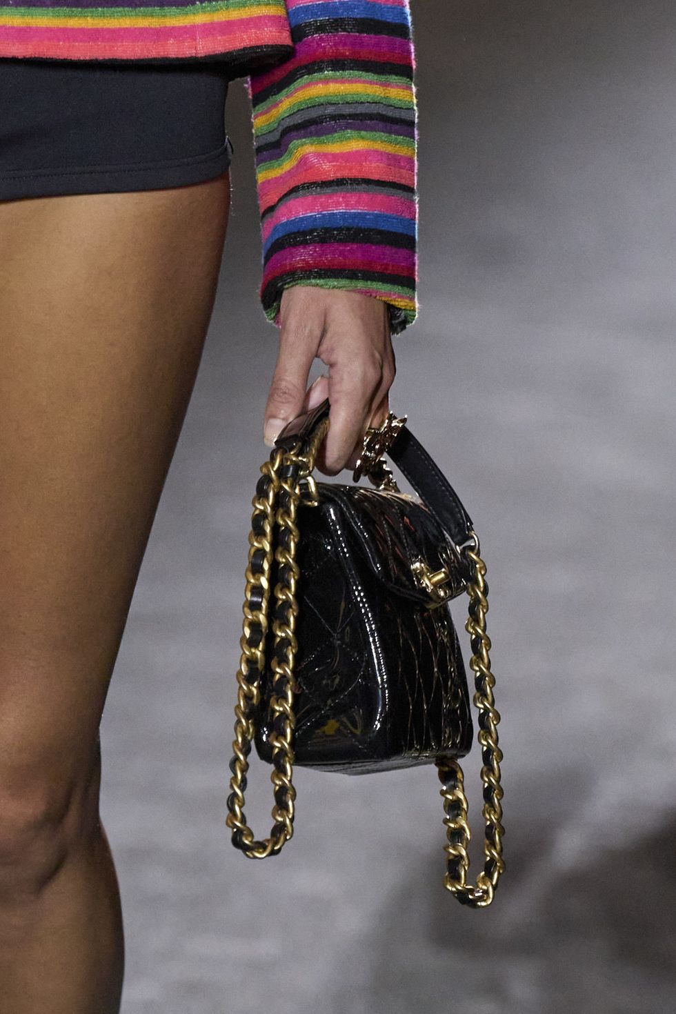 a woman holding a purse