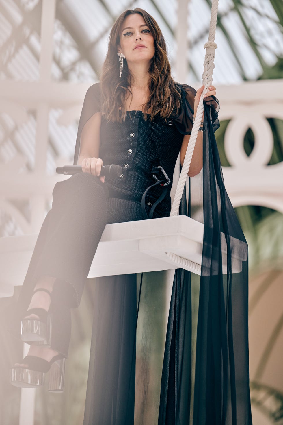 riley keough on a swing