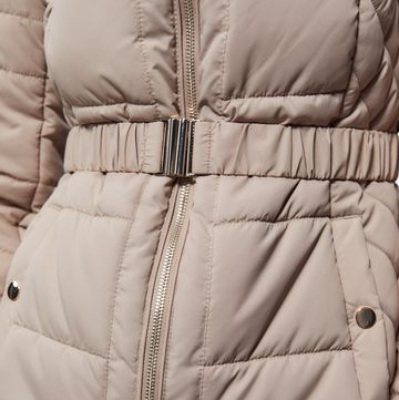 a grey jacket with a zipper