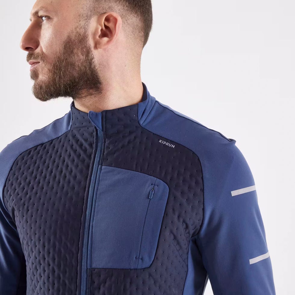 athletic jacket featuring textured fabric and a zippered pocket