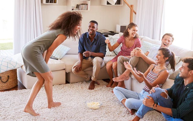 group of adults playing charades game ideas