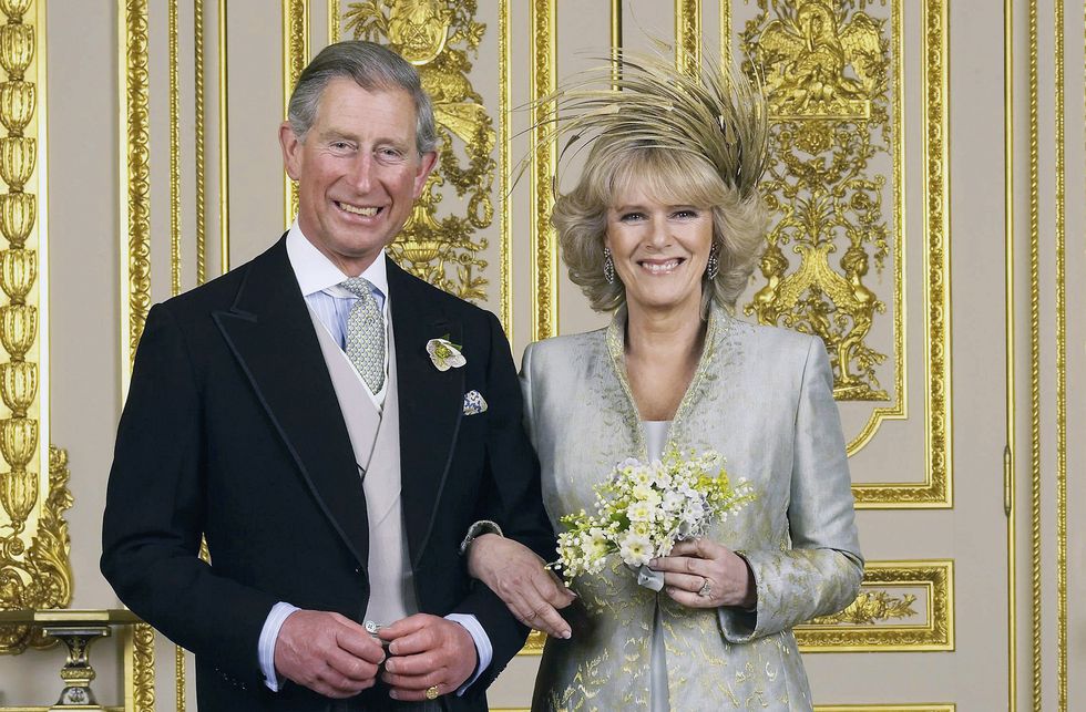 windsor, england   april 9 clarence house official handout photo of the prince of wales and his new bride camilla, duchess of cornwall in the white drawing room at windsor castle after their wedding ceremony, april 9, 2005 in windsor, england photo by hugo burnandpoolgetty images