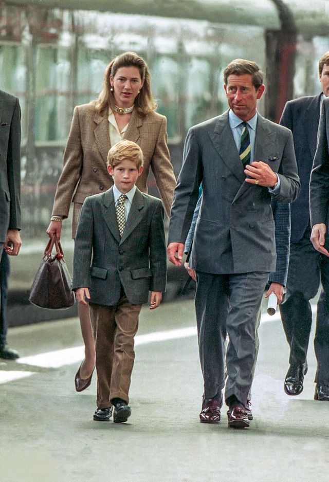 prince charles, prince william, and harry, arrive at aberdeen station