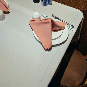 a napkin and fork on a table