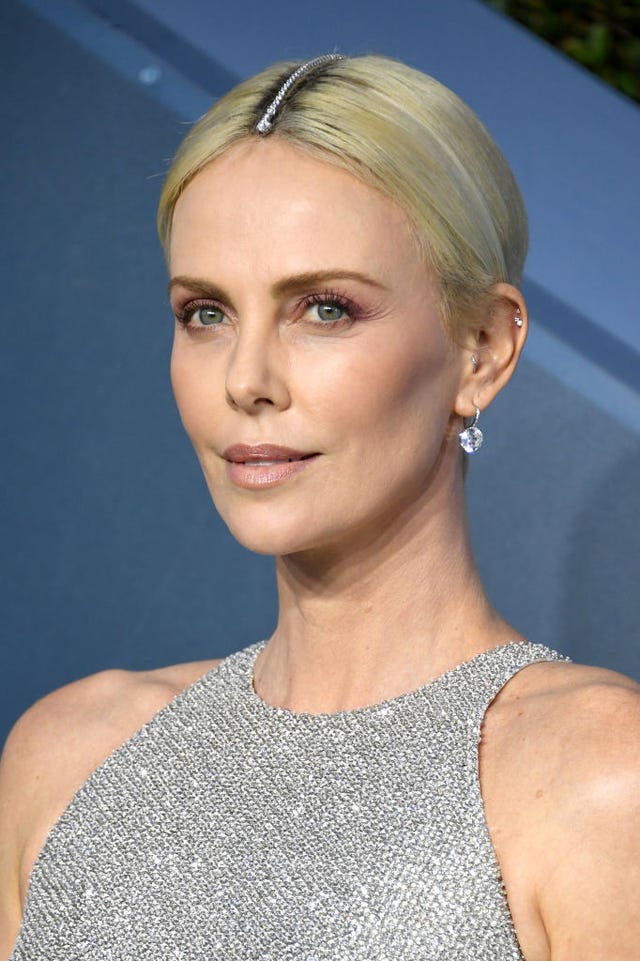 Charlize Theron Just Wore Tiffany Diamonds in Her Hair to Hide Her ...