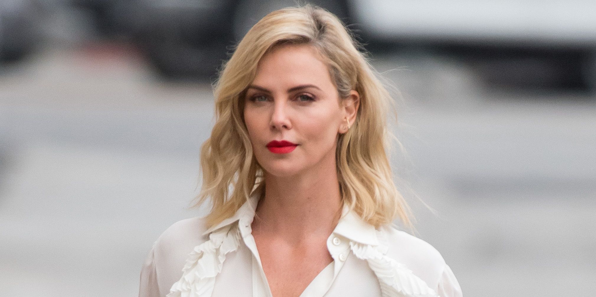 Charlize Theron looks effortlessly chic in a monochrome jumper