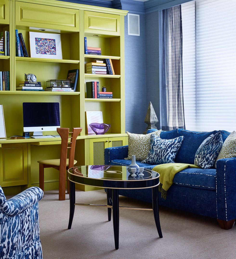 Blue, Furniture, Room, Living room, Shelf, Interior design, Yellow, Shelving, Bookcase, Wall, 