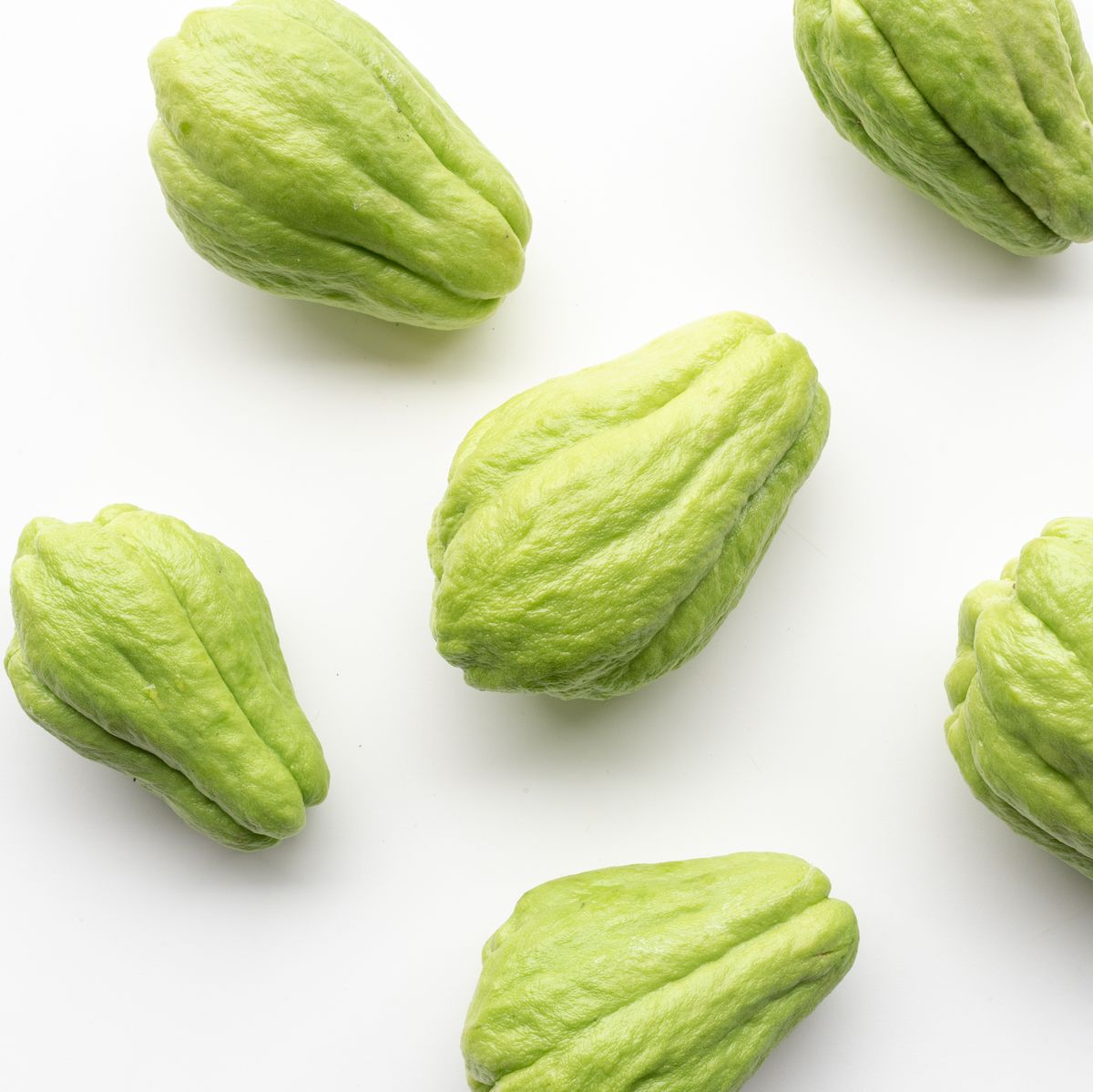Chayote on white background from above