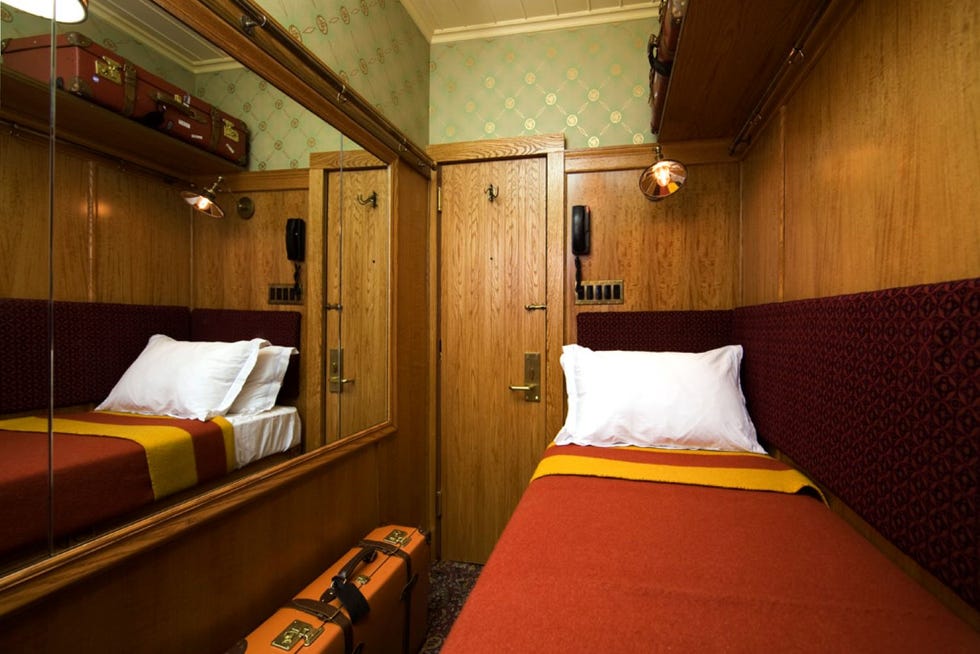 a single bed in a cabin