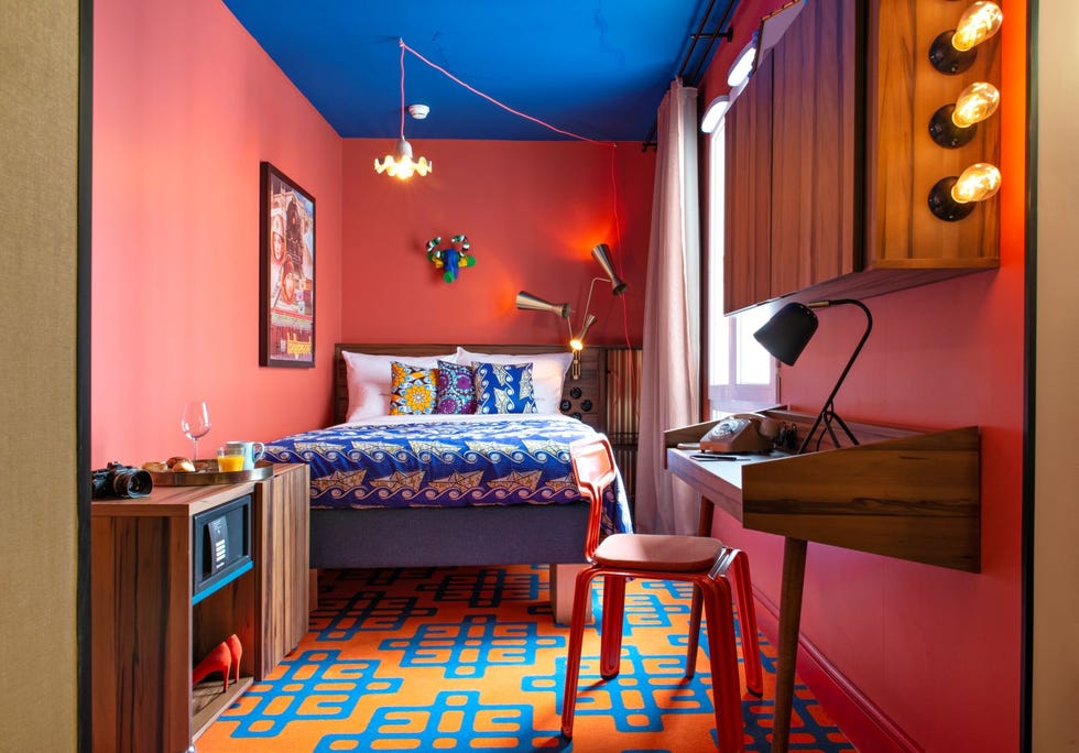 a bedroom with a bed and desk at 25 hours terminus nord