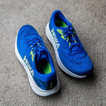 a pair of blue hoka running shoes a pair of blue hoka running shoes