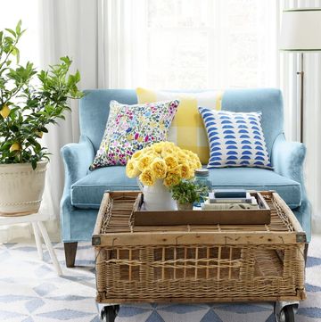 blue sofa with wicker coffee table